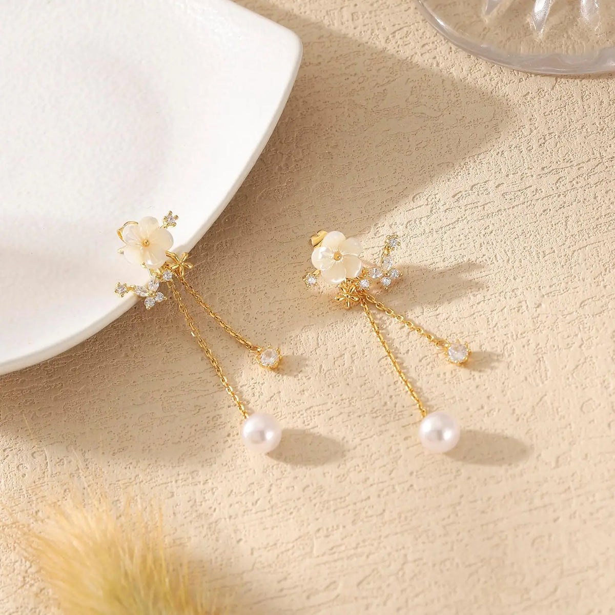 Pendientes de flor con cadena