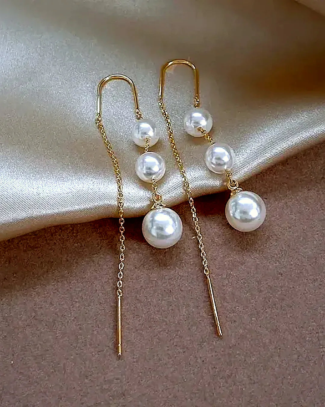 Pendientes largos de perla · Lunares