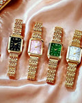 Reloj rectangular dorado · Lunares